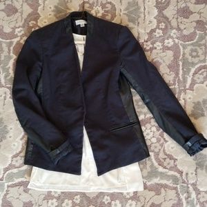Clean cut navy blazer with leather detail